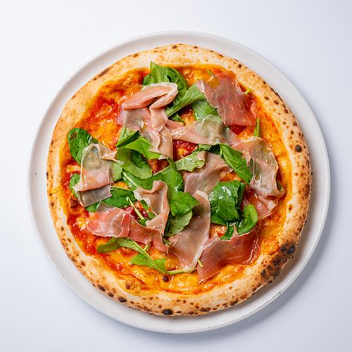 Prosciutto and arugula pizza