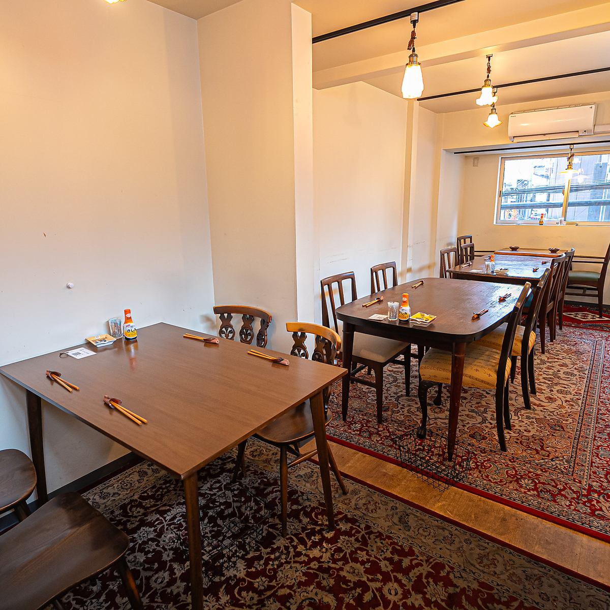 The second floor has a private room that can accommodate up to 12 people.