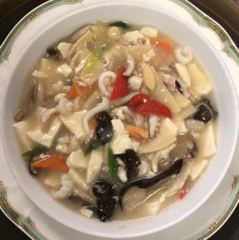 Lightly simmered tofu and seafood