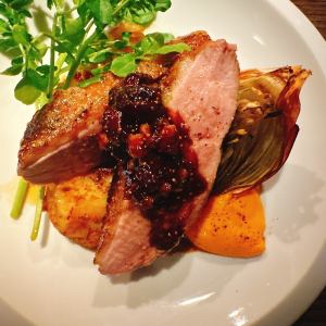 Roasted duck with blood orange, carrot and blackcurrant