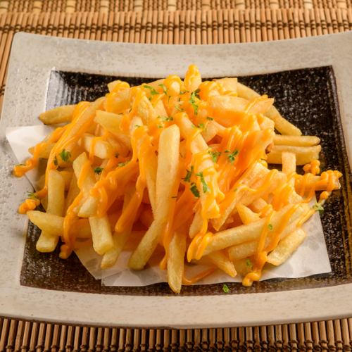 Fried potatoes with cheese sauce