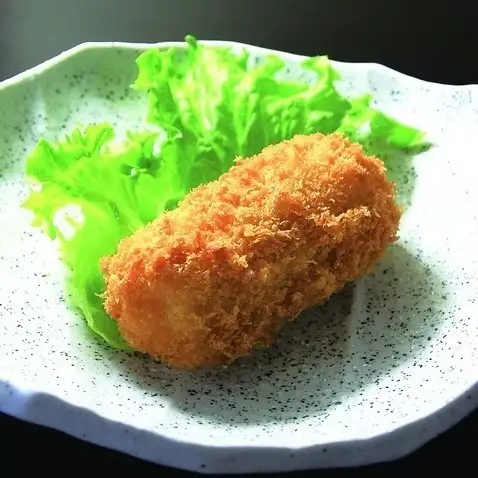 Crab cream croquette (1 piece) / Special shrimp spring roll (1 piece)