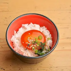 Homemade pickled egg over rice