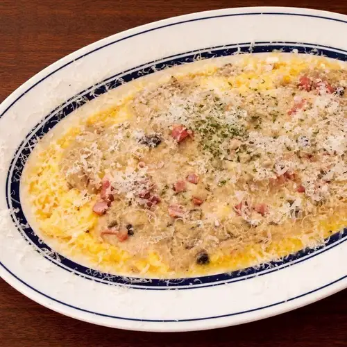 Homemade mushroom omelet with porcini sauce