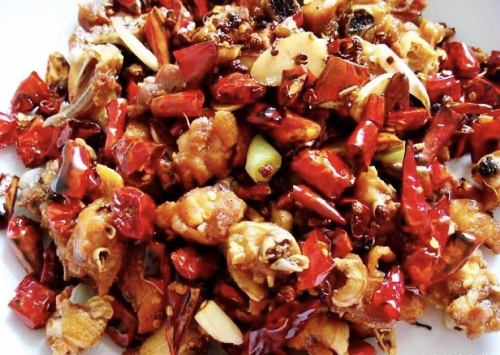 Sichuan-style stir-fried chicken with fried bone (Chinese Laziji chicken)