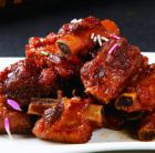 Spare ribs stewed in sweet and sour sauce (sugar vinegar pork ribs)