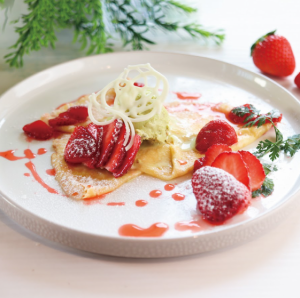 Strawberry and pistachio ice cream crepe