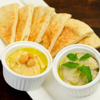 Hummus and Babaganish (chickpea and eggplant dip) with pita red