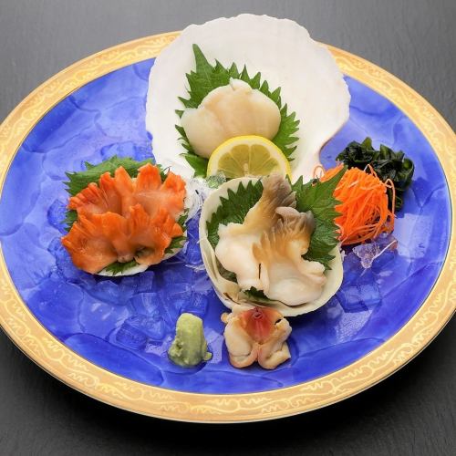 Live shellfish sashimi three-piece platter