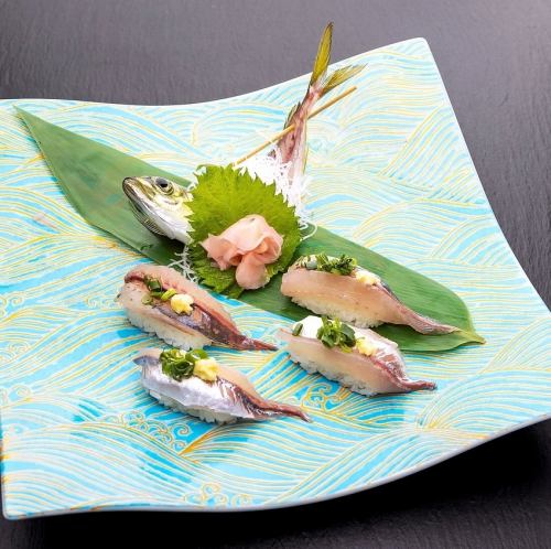 Live horse mackerel sushi