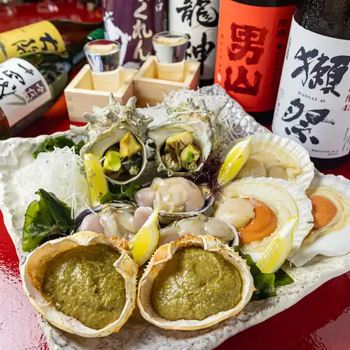 春日井駅前で貝の炉端焼き