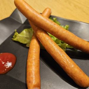 Coarsely ground long sausage