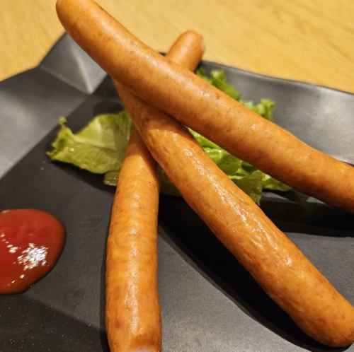 Coarsely ground long sausage