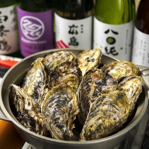 Steamed oysters from Higashihiroshima Akitsu with local sake