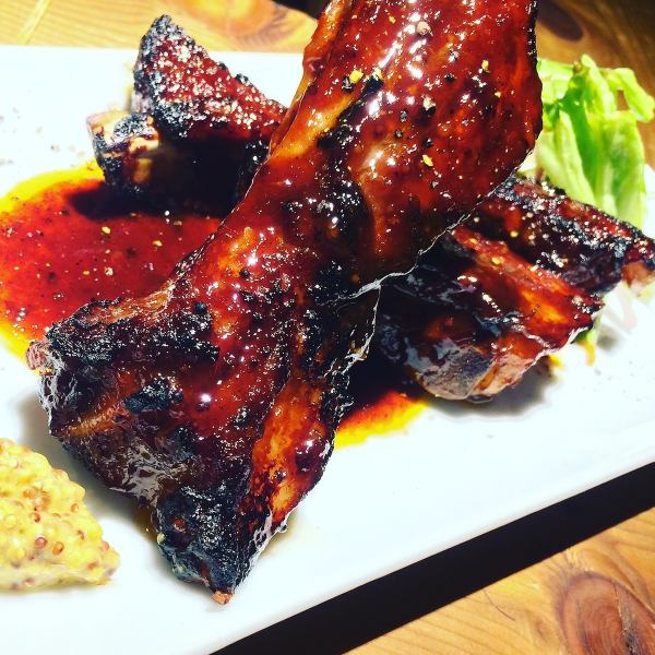 Grilled pork spare ribs with homemade BBQ sauce