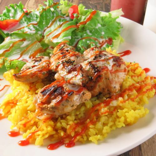 Chicken over rice with various spices!