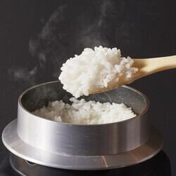 Tabletop rice cooked in a pot
