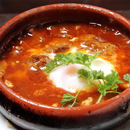 Akagi Wagyu beef tendon simmered for 8 hours topped with a soft-boiled egg