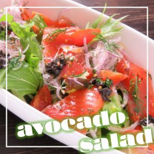 Salmon carpaccio with avocado salad