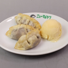 Chocolate banana dumplings served with vanilla ice cream