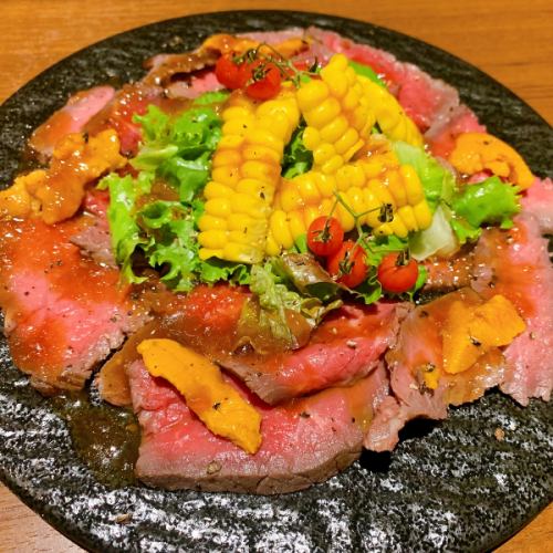 Homemade roast beef topped with sea urchin and seasonal vegetables