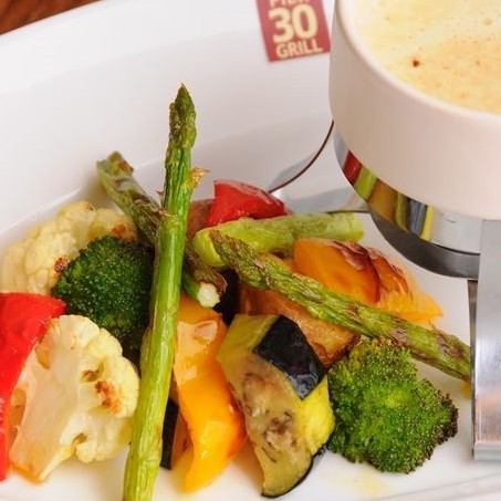 Grilled seasonal vegetables with bagna cauda sauce