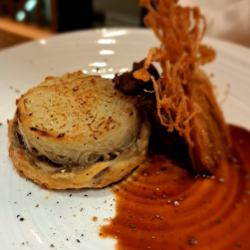 Wagyu beef tail stewed in red wine and potato tart