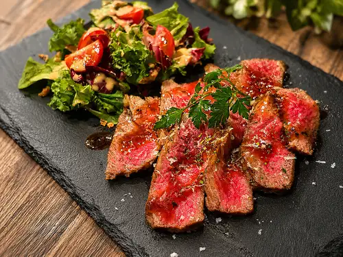 Roast beef made with Japanese Black Wagyu beef, served with truffle sauce.