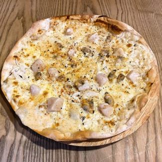 Clam chowder style pizza with Parmesan cheese, clams and scallops