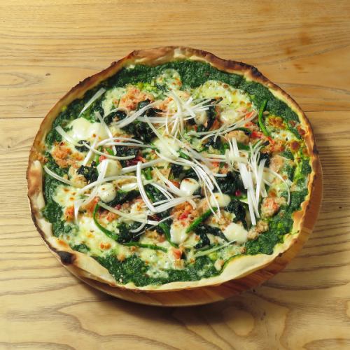 Homemade spinach sauce and snow crab mozzarella cheese pizza