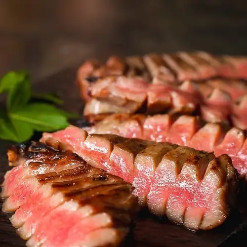 Thickly sliced grilled beef tongue