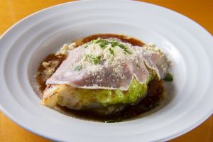 cabbage steak with prosciutto and cheese