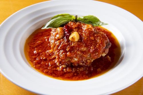 Domestic thigh meat with garlic tomato sauce
