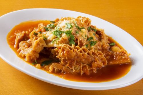 Spicy tomato stew with tripe