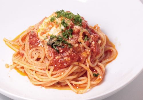 Tomato sauce pasta with basil and mozzarella cheese