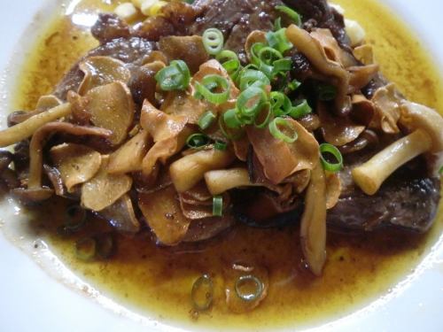Beef loin steak with garlic mushrooms