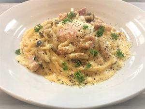 Carbonara with thick-sliced bacon and soft-boiled egg