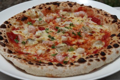 Seafood pizza with shrimp, clams and shrimp