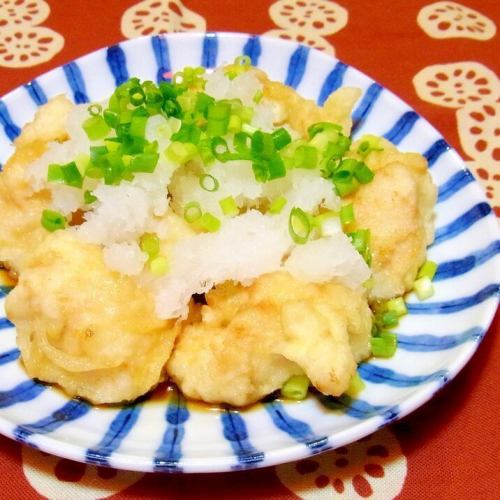 Garnished with grated chicken tempura