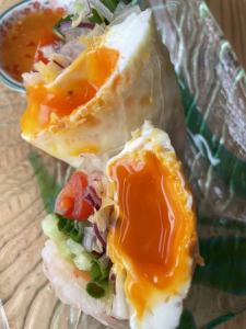 Shrimp and fried egg spring rolls