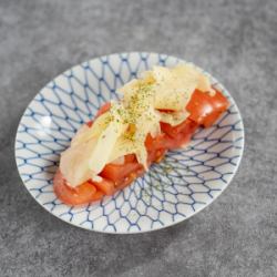 Pickled ginger and ripe tomatoes marinated in ginger