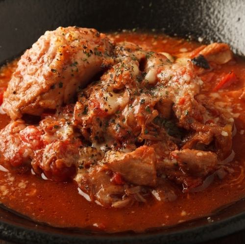 Chicken stewed in tomato wine