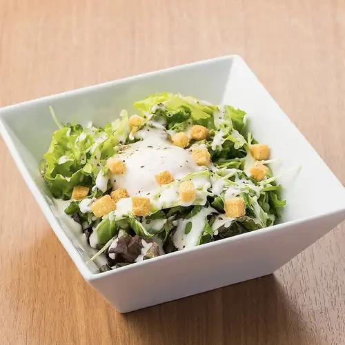 Caesar salad with crispy bacon