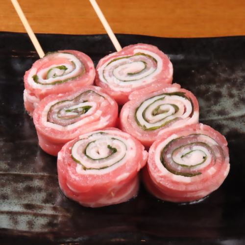 Pork wrapped in shiso leaves on skewers