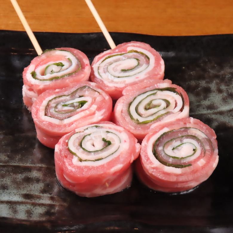 Pork wrapped in shiso leaves on skewers
