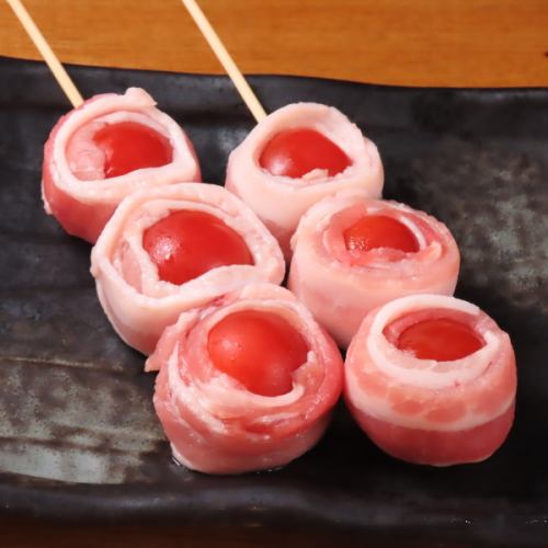 Tomato and pork skewers