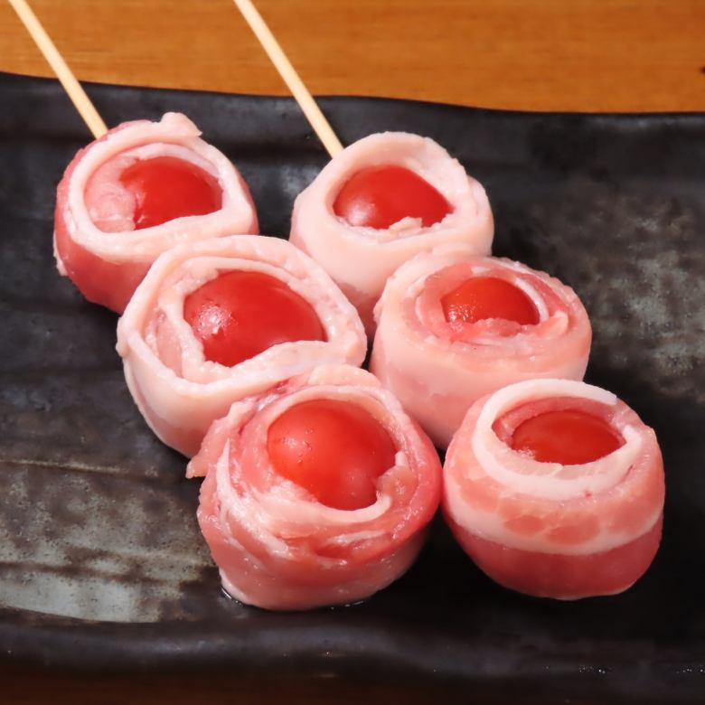 Tomato and pork skewers