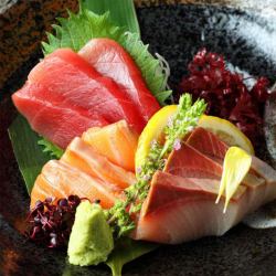 Assortment of three types of fresh fish sashimi