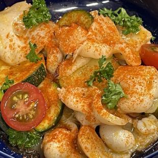 Octopus and zucchini in herb oil