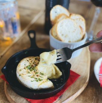 Oven-baked whole camembert